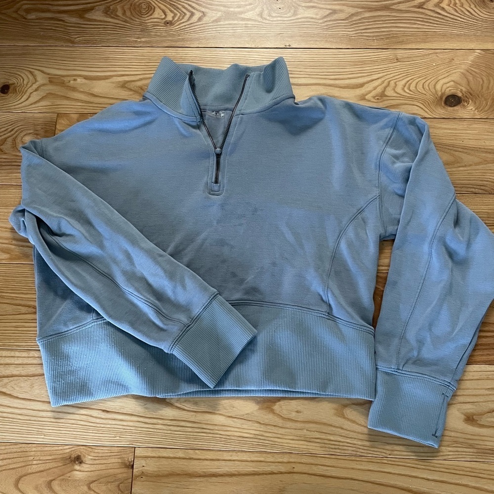 Woman’s Blue Half-Zip Sweater
